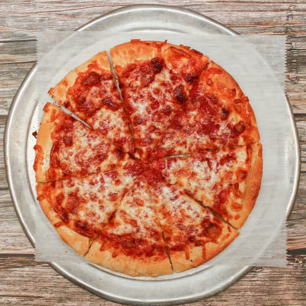 A Cosmic Pizza cheese pizza, sliced into eight pieces, on a metal pan.