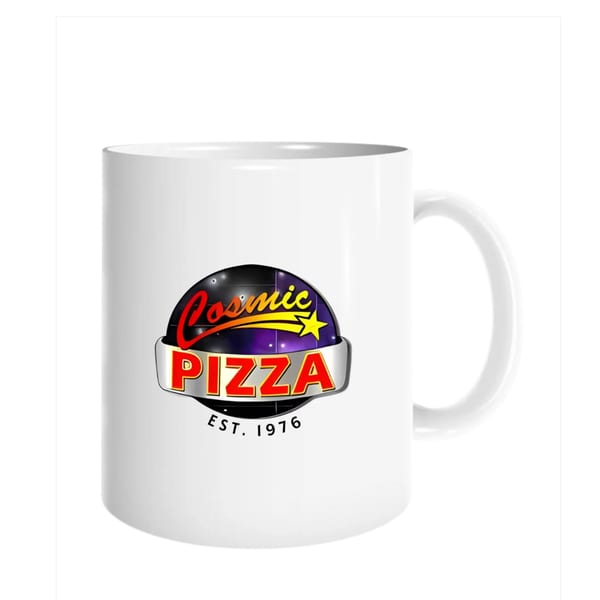 White mug featuring the Cosmic Pizza logo with a black sphere, yellow star, and red text.