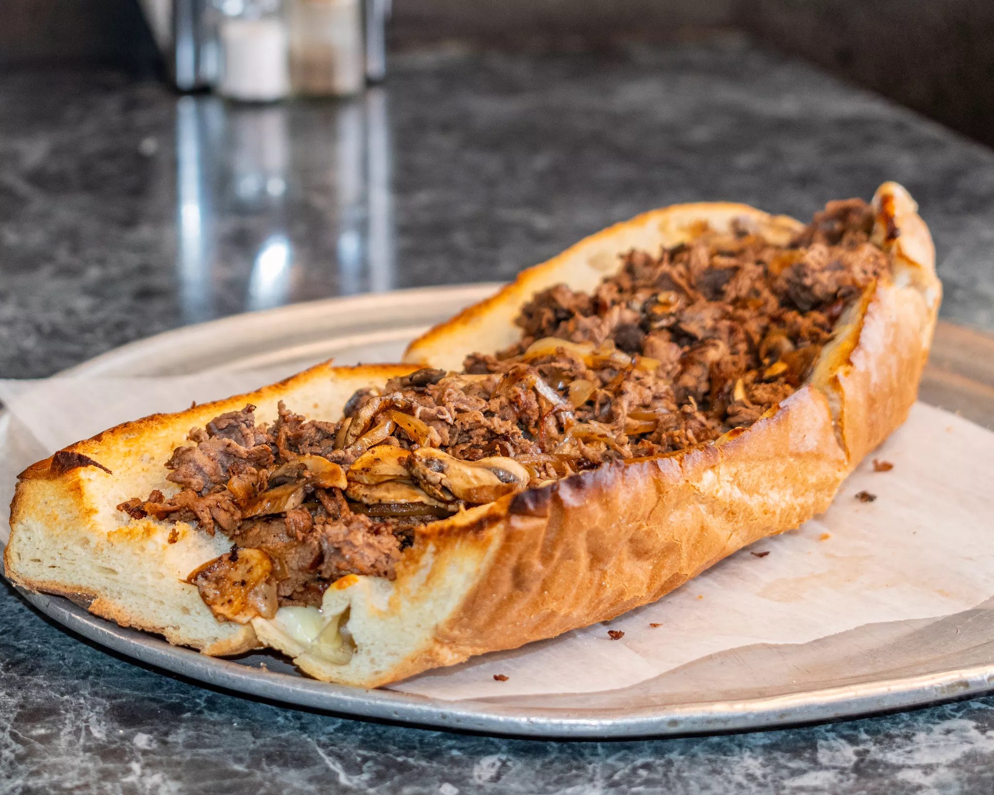 (X-Lg) #10 Steak, Onions, Cheese & Mushrooms.