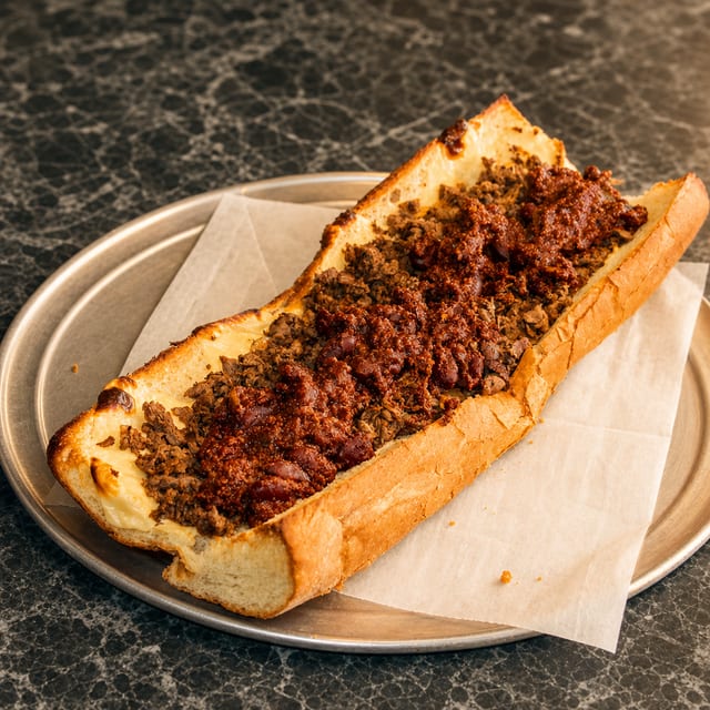(X-Lg) # 7 Steak, Onions, Cheese, Chili.